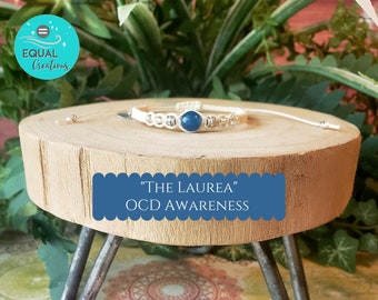 The Laurea OCD Awareness Bracelet Cream Cording Teal Glass Bead Silver Spacers Clear Glass Seed Beads Handmade Handstamped Handwoven