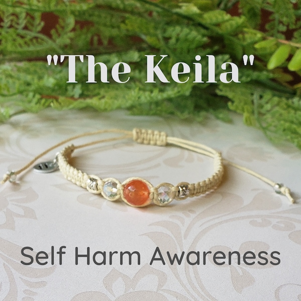 The Keila Self Harm Awareness Bracelet Orange Glass Bead Handmade Handstamped Handwoven Cream Cording