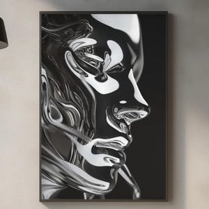 May include: A framed black and white art print featuring a stylized, metallic rendering of a human face in profile. The artwork has a reflective, liquid-like quality, with highlights and shadows creating depth and dimension. The piece is mounted in a black frame.