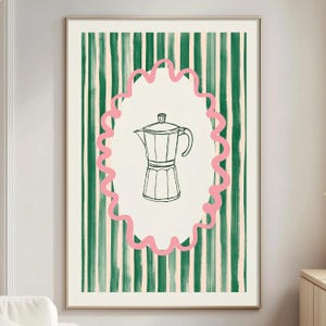 May include: A framed wall art print featuring a black line drawing of a moka pot centered within a pink scalloped oval frame. The background consists of vertical green and cream-colored brushstroke stripes, creating a textured pattern.