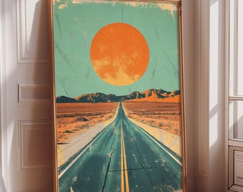 May include: Framed art print featuring a desert landscape with a long road leading to distant mountains. A large orange sun dominates the sky above the road. The artwork has a vintage, distressed aesthetic with a teal sky and a gold frame.