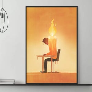 May include: A framed art print depicts a person seated at a table, with a large candle in place of their head, and a flame burning above. The artwork is rendered in warm orange and brown tones, with a minimalist style. The person is wearing an orange shirt and black pants.