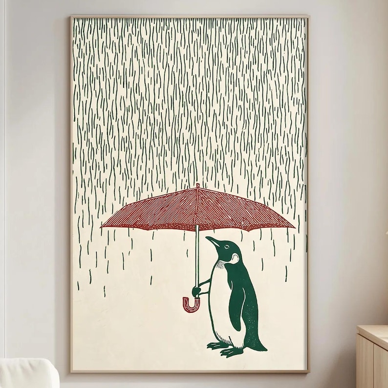 a penguin standing under an umbrella, with rain falling around it.