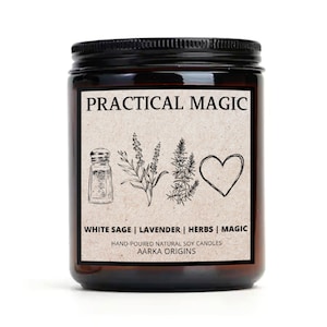 May include: A brown glass jar candle with a black lid and a white label that reads "PRACTICAL MAGIC". The label also includes illustrations of a salt shaker, lavender, rosemary, and a heart. The text on the label also reads "WHITE SAGE | LAVENDER | HERBS | MAGIC", "HAND-POURED NATURAL SOY CANDLES", and "AARKA ORIGINS".