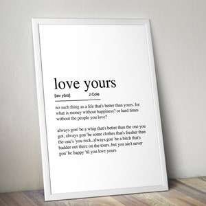 May include: Black and white typography print with the definition of the phrase "love yours" by J. Cole. The definition is a quote about self-love and happiness.