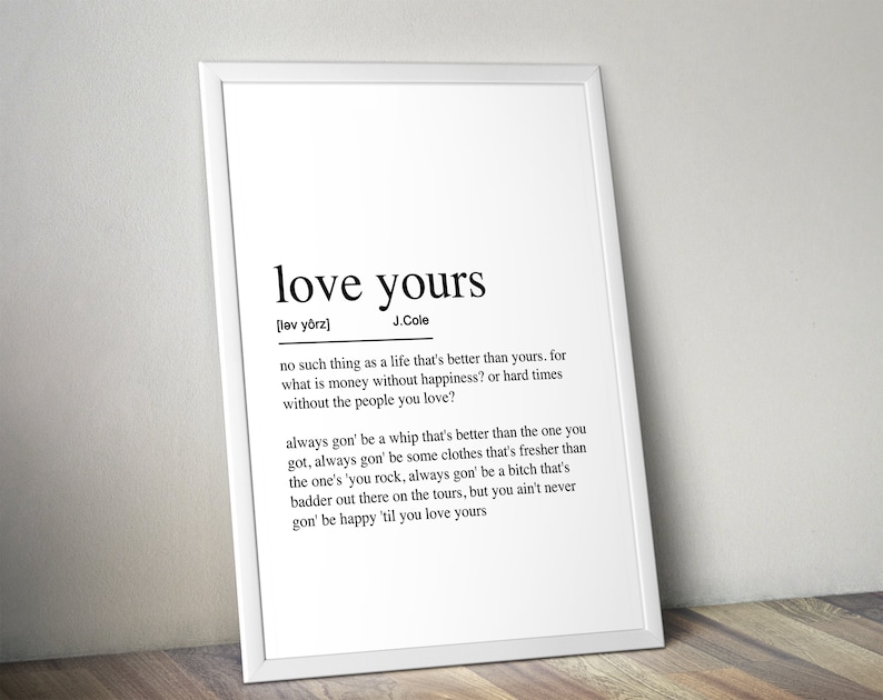 May include: Black and white typography print with the definition of the phrase "love yours" by J. Cole. The definition is a quote about self-love and happiness.