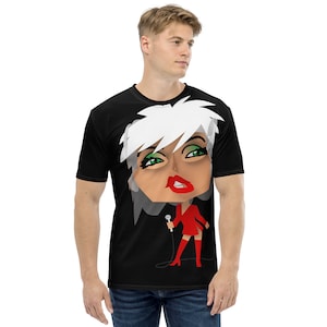 May include: A black t-shirt with a cartoon image of a woman with white hair, green eyes, and red lipstick. She is wearing a red dress and red boots and holding a microphone.
