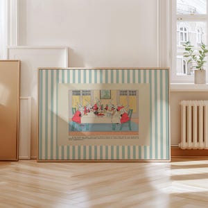 May include: Framed vintage illustration featuring a group of anthropomorphic rabbits gathered around a table. The rabbits, dressed in red coats, are engaged in a meal. The frame has a light wood finish with a striped blue and white pattern.