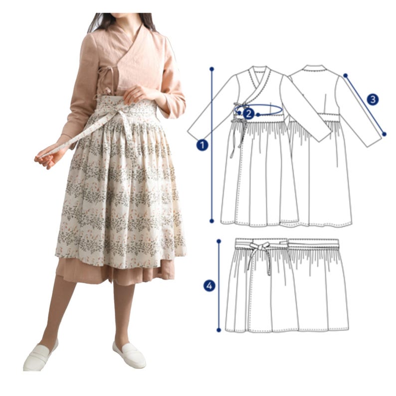 Puede incluir: Una falda de estampado floral blanco y marr&oacute;n con una blusa a juego. La falda es de largo hasta la rodilla y tiene un lazo en la cintura. La blusa es una blusa de manga larga con cuello en V. El atuendo se muestra con medidas para la blusa y la falda.