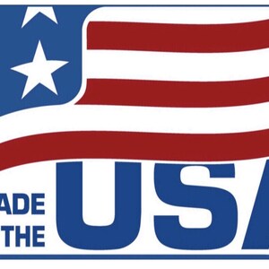 May include: A rectangular graphic with the text "MADE IN THE USA" in white and blue. The design incorporates the American flag with red and white stripes and blue field with white stars.
