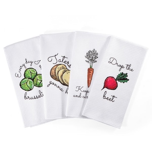 Set of four kitchen dish towels with witty and pun-filled sayings to brighten your chores