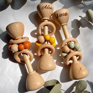 Personalized wooden rattle for newborns and babies with engraving