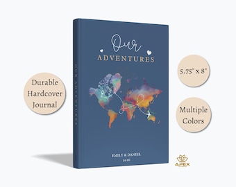 May include: A blue hardback journal measuring 14.6 cm by 20.3 cm. The cover features a watercolour world map with a dashed flight path, the text Our Adventures, two small hearts, and the personalised text Emily & Daniel 2026.