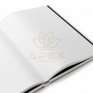 May include: An open book with blank white pages, featuring a light beige cover and a black spine. The center of the pages displays a faint, light beige logo with the text APEX ARTISANS printed in a clean, sans-serif font on the right page.
