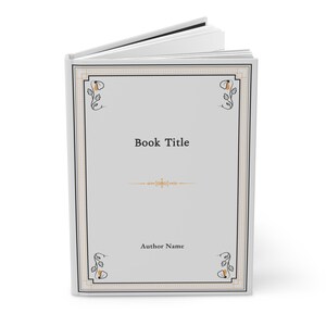 以下が含まれることがあります： 装飾的な枠と「Book Title」と「Author Name」という黒いテキストが書かれた白い本の表紙