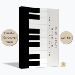 May include: A durable hardcover journal measuring 5.75 inches by 8 inches. The cover features a graphic design of black and white piano keys on the left side. The right side is light gray with the text THE SONGS INSIDE MY HEAD JAYDEN SMITH.