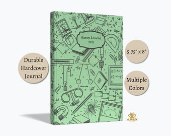 May include: A light green hardback journal measuring 14.6 cm by 20.3 cm. The cover features a dark green repeating pattern of scientific instruments, physics equations, and diagrams. A central label reads Aaron Lovene 2025.