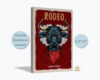 May include: A hardcover journal measuring 5.75 inches by 8 inches with a dark red cover featuring a central illustration of a bull head with horns, white smoke, and the text RODEO at the top and AARON LOVENE at the bottom, with BULL RIDER JOURNAL on the spine.