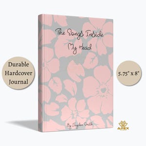 May include: A durable hardcover journal measuring 5.75" x 8" with a light gray background and a repeating pattern of light pink flowers. The front cover features the text "The Songs Inside My Head" and "By Jayden Smith" in black script.