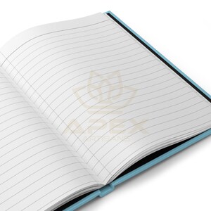 May include: An open notebook with light blue covers and white lined pages. The center of the pages features a faint, watermark-style logo with a stylized lotus shape above the text APEX ARTISANS in a light brown color on the white paper.