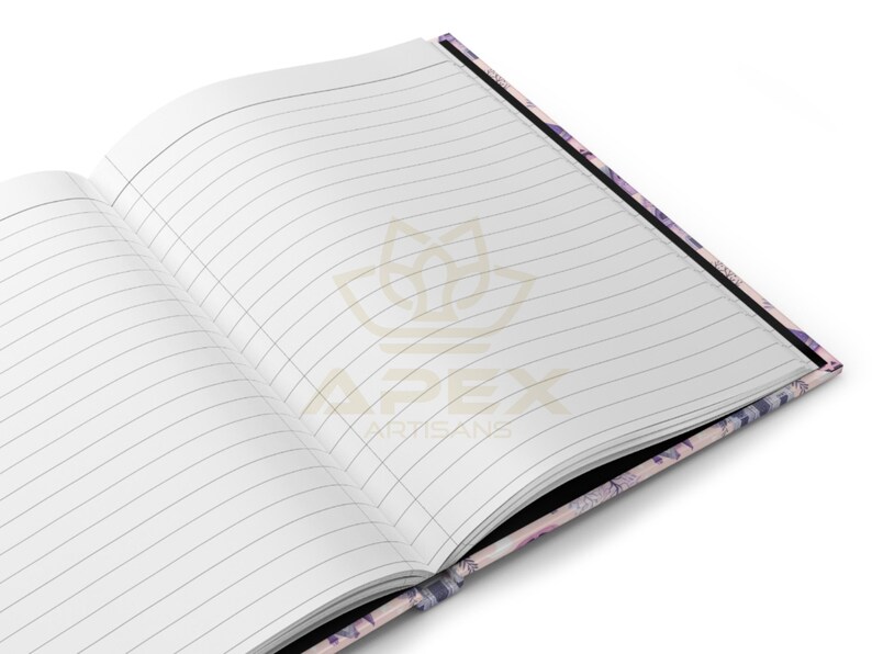 May include: An open notebook with lined pages and a floral patterned cover. The cover is a mix of pink, purple, and white.