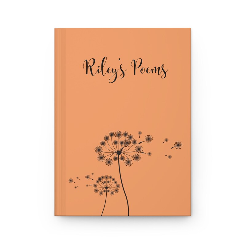 May include: A hardcover journal with a solid peach-colored cover. The front features the black text "Riley's Poems" in a cursive script above a black graphic illustration of two dandelion flowers with seeds blowing in the wind to the right.