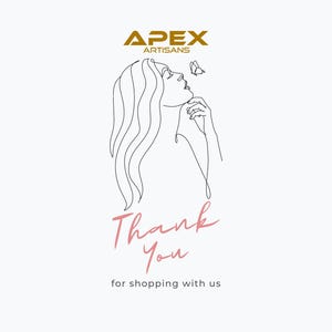 May include: A white card featuring the gold text APEX ARTISANS at the top. Below is a black line art illustration of a person with long hair and a butterfly near their face. The pink text Thank You is centered, followed by the black text for shopping with us.