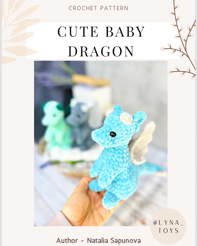 May include: A light blue crocheted baby dragon with white horns and wings. The dragon is held in a hand, with two other dragons in the background. The text "CROCHET PATTERN" and "CUTE BABY DRAGON" are at the top of the image.