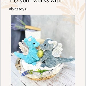May include: Two crocheted baby dragons, one light blue and one gray, sit in a woven basket. The dragons have wings and are facing each other, holding a golden egg. Text on the image reads "Your baby dragon is ready!" and "#lynattoys".