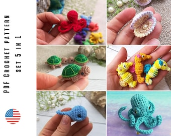 May include: A set of five crochet amigurumi ocean animal patterns. The patterns include a red octopus, a blue whale, a green turtle, a yellow seahorse, and a pink seashell. The patterns are available as a PDF download.