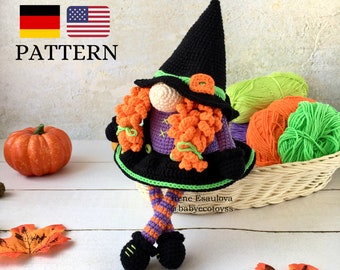 May include: Crocheted Halloween witch gnome with orange hair, purple dress, black hat, and green and orange striped legs. The gnome is sitting on a white wooden surface with a pumpkin and fall leaves.