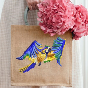 Colorful flying parrot.  Machine Embroidery Designs . Embroidery Parrot . Tropical bird. Instant download.