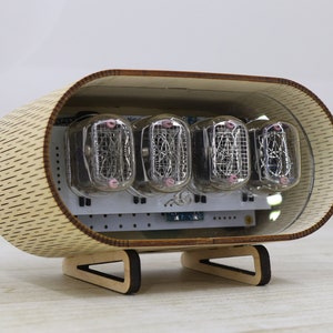 Wooden IN-12 nixie tube clock with a transparent insert. Vintage handmade clock.