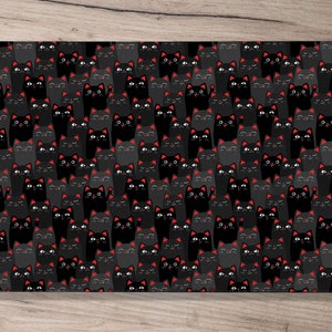 May include: A black and grey phone case with a repeating pattern of black cats with red noses and eyes. The cats are arranged in a grid pattern.