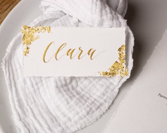 Wedding name tags in gold, place cards in handmade paper finish with gold leaf, calligraphed by hand with golden ink, personalized