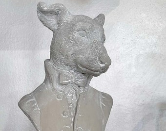 Dog bust sculpture in concrete