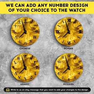 May include: Four gold-colored clock faces with different number styles: Chinese, Roman, Arabic, and Modern. The clock faces have a textured, crumpled gold foil appearance.