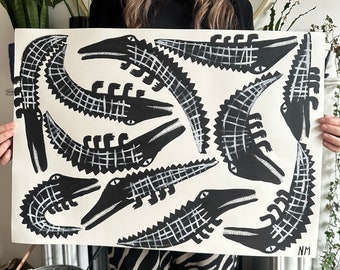 Black crocodiles. On paper. By Nancy Mckie. Original contemporary artwork.