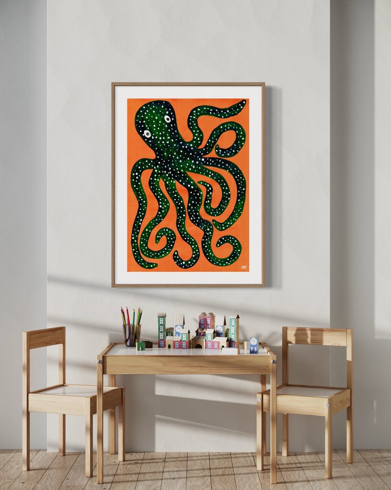 May include: A framed illustration of a green octopus with white spots on an orange background.