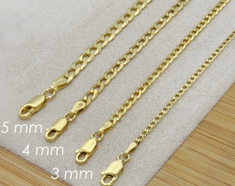 Könnte beinhalten: Vier goldene Ketten in verschiedenen Breiten, auf einer Holzoberfläche ausgelegt. Die Ketten sind mit ihrer Breite in Millimetern beschriftet: 2 mm, 3 mm, 4 mm und 5 mm.