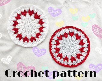May include: Two white crochet doilies with red heart accents. The doilies are on a white fabric background with hand-drawn hearts in various colors.