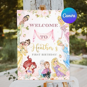 May include: A pink and gold welcome sign for a first birthday party, featuring illustrations of Disney princesses. The sign reads "Welcome to Heather's First Birthday!" with floral accents and a Canva logo.