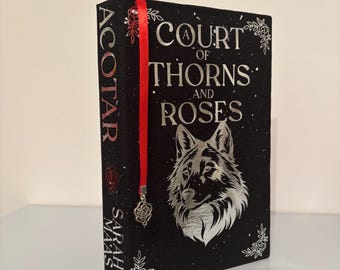 Una corte de rosas y espinas, libro de tapa dura encuadernado a mano con bordes rociados