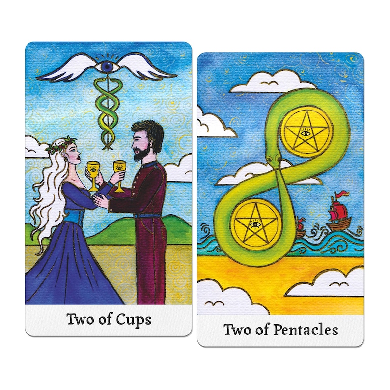 May include: Two tarot cards. The first card, "Two of Cups," depicts a couple toasting with golden goblets. The second card, "Two of Pentacles," shows two pentacles within a green, serpentine shape. Both cards have a blue sky background.