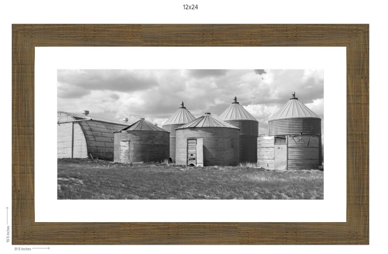Framed Print 12x24 - Steel Sentinels - Rustic Farm Photography Print of Montana Grain Bins Espresso Rustic Frame - Image 1
