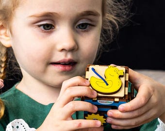 Duck Busy Cube: Wooden Montessori Stroller Toy for Sensory Play, Mini Car Box | GoodPlay