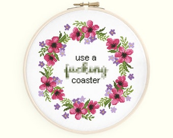 Subversive quote cross stitch pattern. Use a fucking coaster saying in a pink floral wreath. Instant download PDF #148