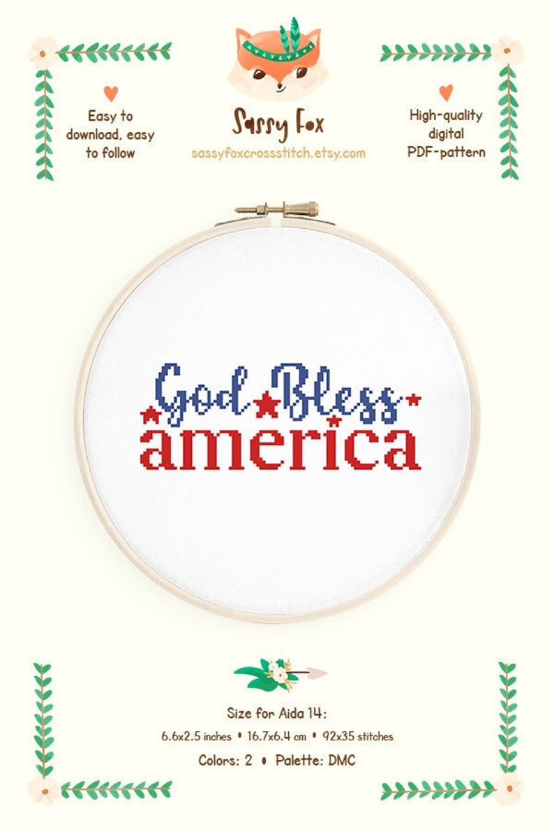 Pode incluir: Bordado em ponto cruz em um bastidor de madeira com as palavras "God Bless America" em vermelho e azul. O desenho est&aacute; em tecido branco. A imagem inclui o texto "Sassy Fox" e "Easy to download, easy to follow".