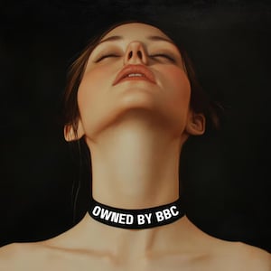 May include: A portrait of a person with closed eyes and a black choker. The choker has the text "OWNED BY BBC" in white. The person's skin is fair with a slight blush, and the background is dark.