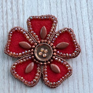 Broche de cuentas con forma de flor